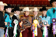 photo of a western equestrian riders with ribbons