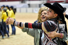 photo of a western equestrian riders dancing