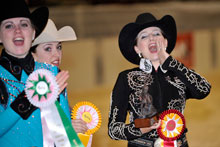 photo of equestrian riders with ribbons